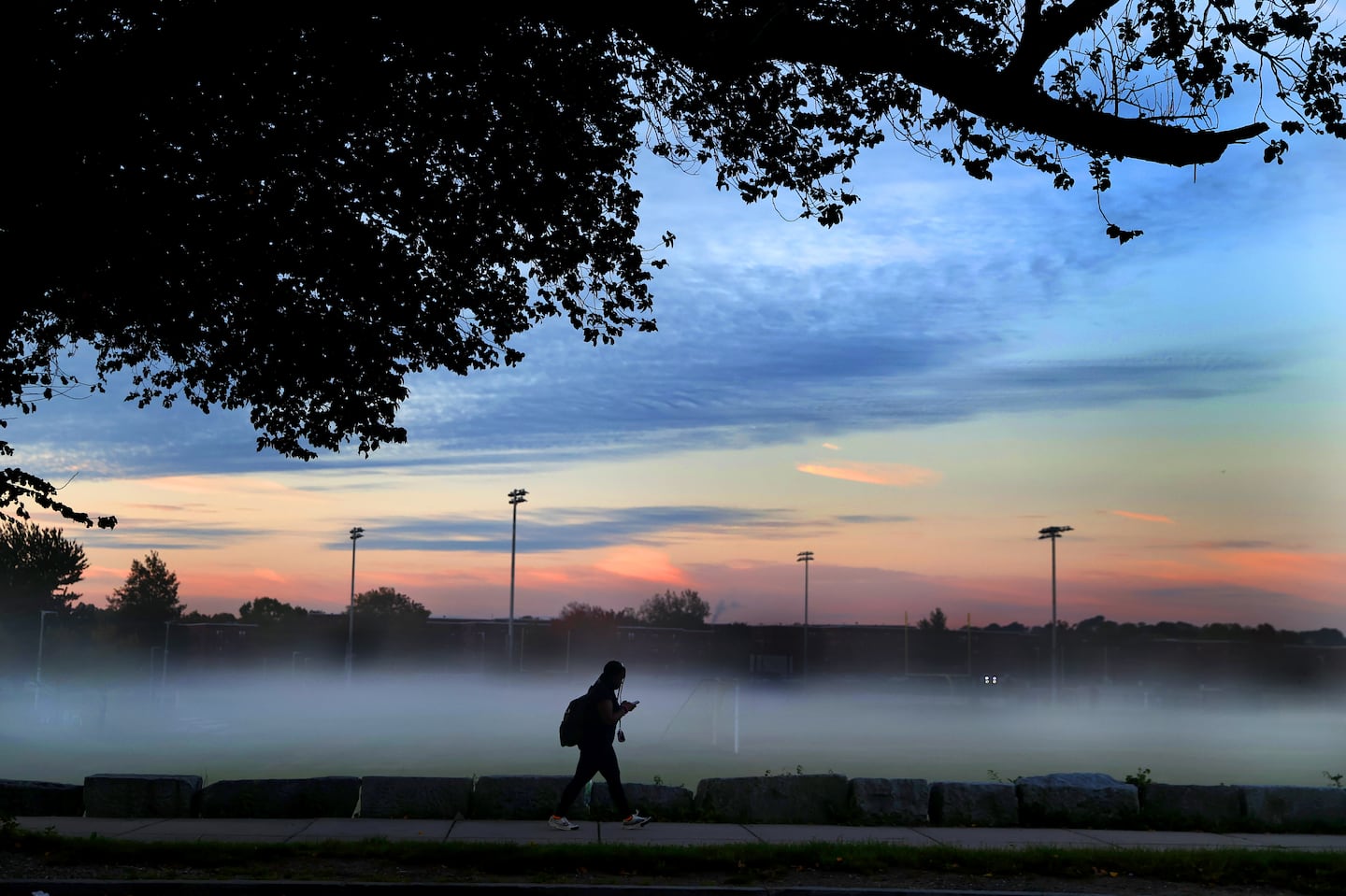 A student walked to school along Talbot Avenue near Franklin Field in Dorchester in 2021.