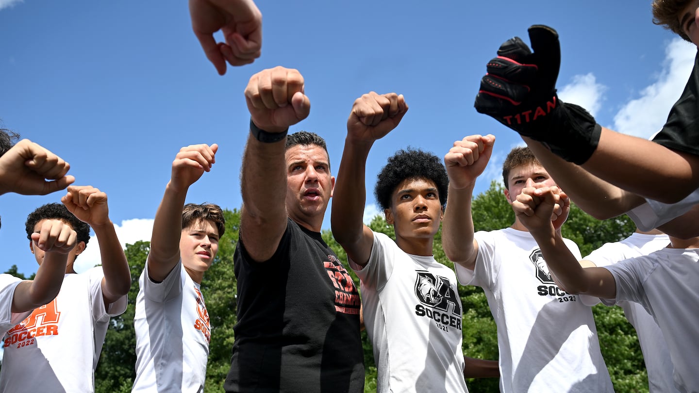 John Barata (center) and his Oliver Ames boys' soccer team is all in to make another run in Division 2.