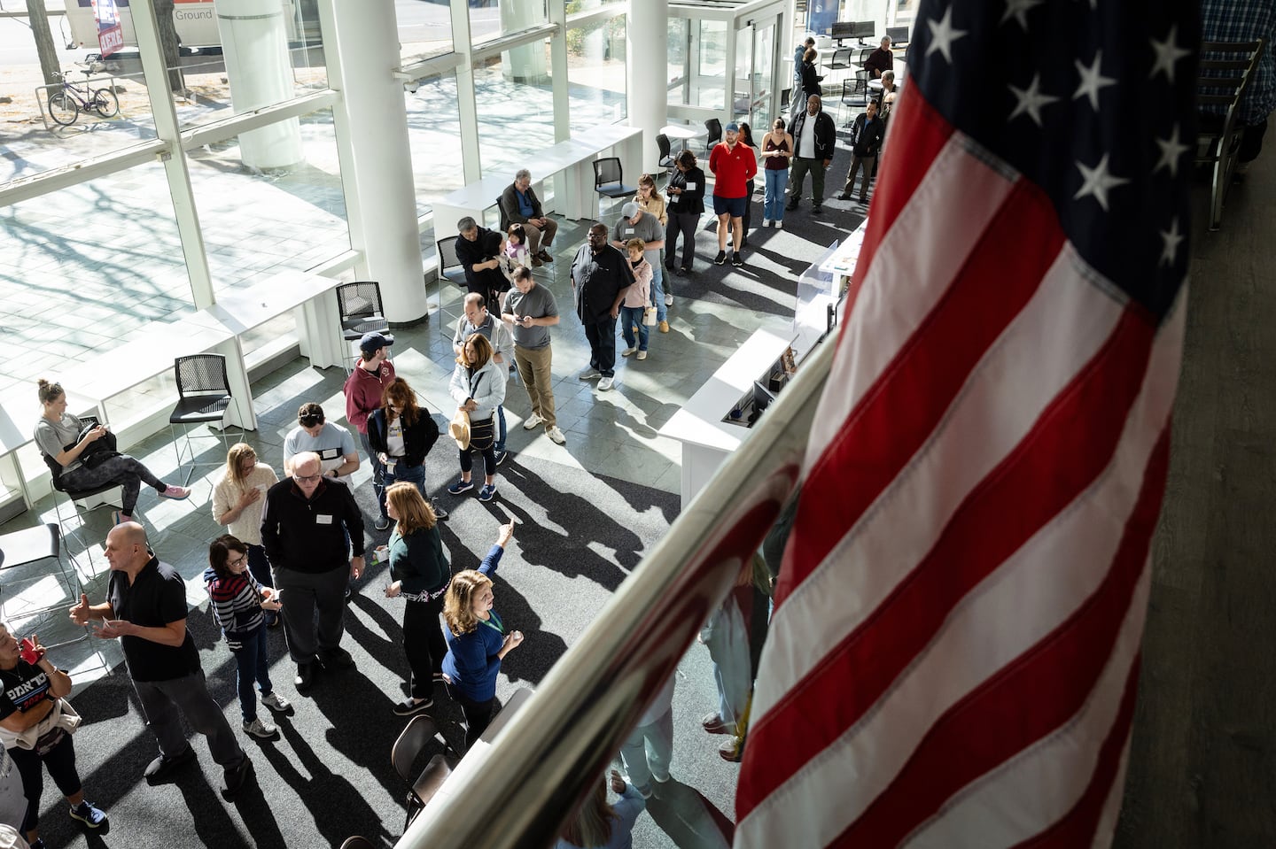 Voters lined up to cast their ballots at the Stamford Government Center on the first day of early voting on Oct. 21 in Stamford, Conn.