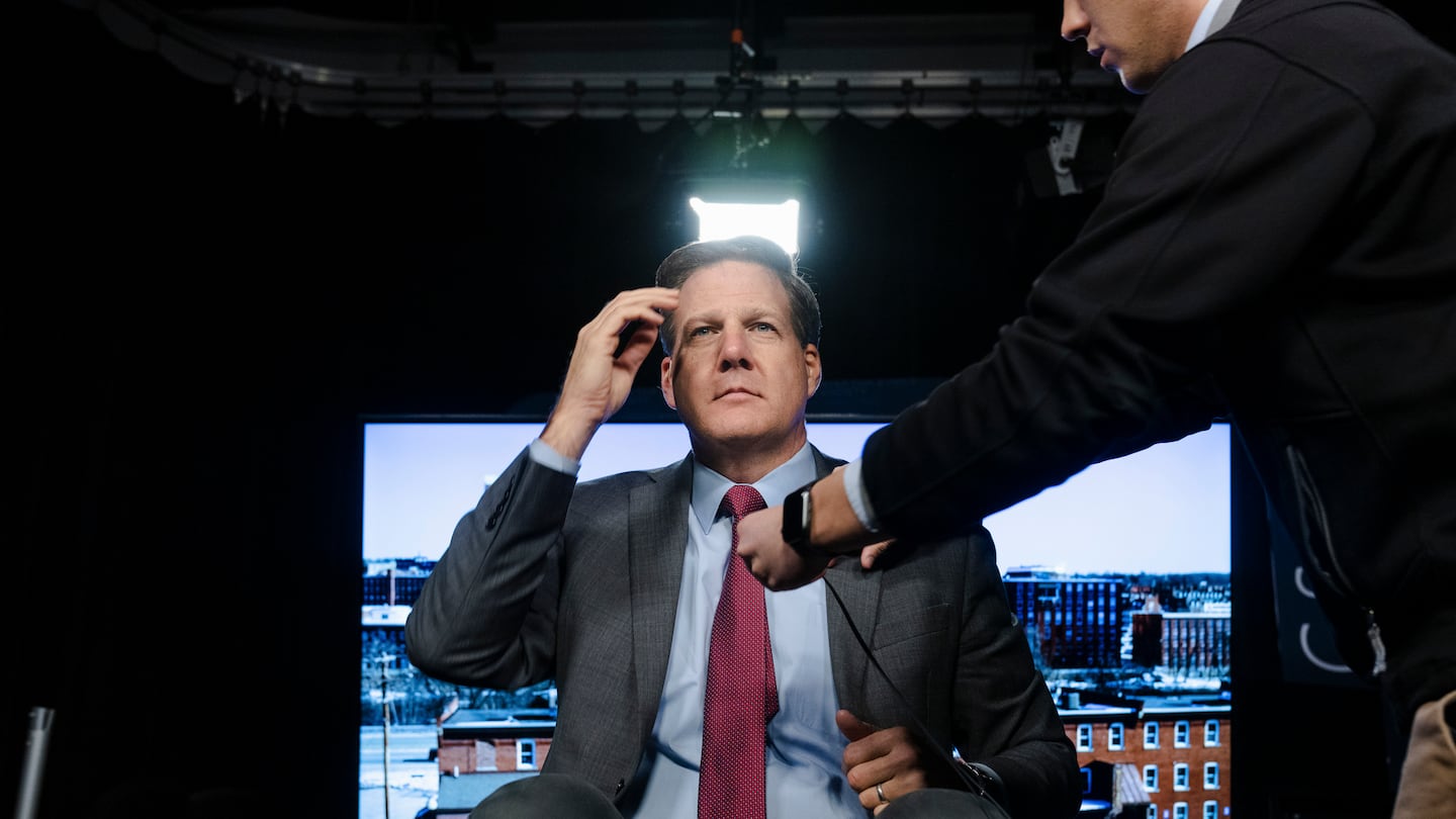 Governor Chris Sununu of New Hampshire, getting prepared for a TV interview at the New Hampshire Institute of Politics in Manchester, N.H., in February 2023, explained in a Globe op-ed why he's choosing the Republican ticket despite not being Donald Trump's "biggest fan."