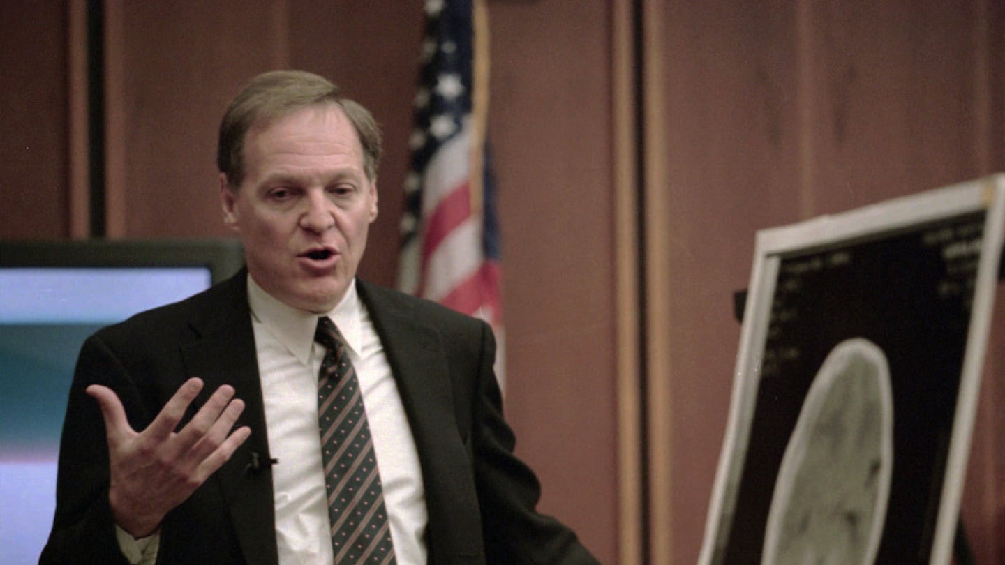 Dr. Eli Newberger, pediatrician and head of the Child Protection Unit at Boston Children's Hospital, testified in front of a medical display in the murder trial for former au pair Louise Woodward.