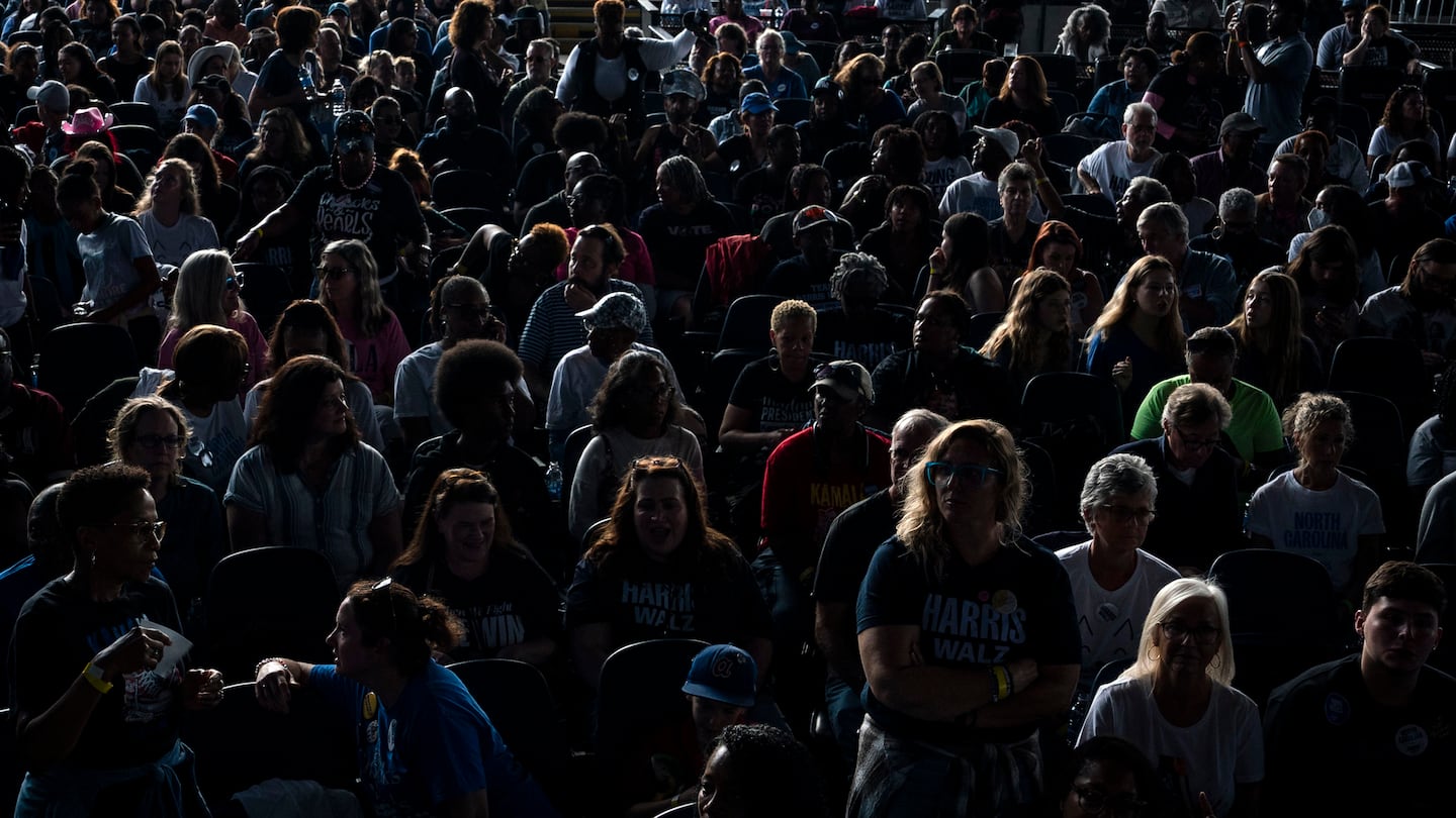 Supporters wait before Vice President Kamala Harris, the Democratic nominee for president, delivers remarks at PNC Music Pavilion in Charlotte, N.C., Nov. 2. Voters are heeding the warnings of Harris and former president Donald Trump, who have framed the presidential race as an existential battle.