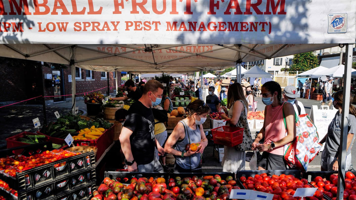 People shopped for produce at the Union Square Farmers Market on Aug. 6, 2022.