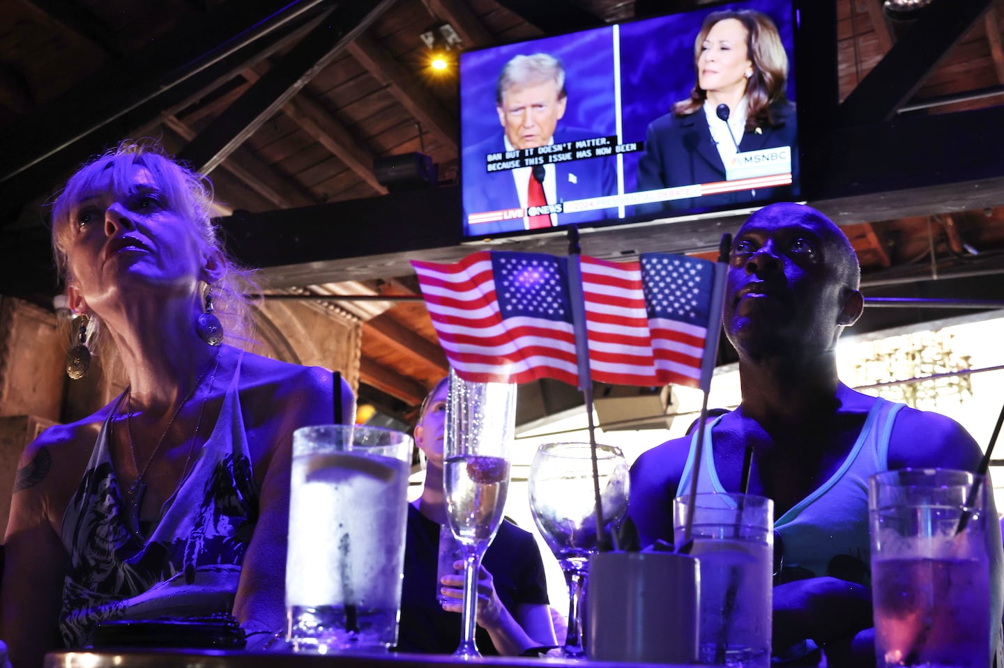 People watched the ABC News presidential debate between Democratic presidential nominee Vice President Kamala Harris and Republican presidential nominee former president Donald Trump at a debate watch party in West Hollywood, Calif.