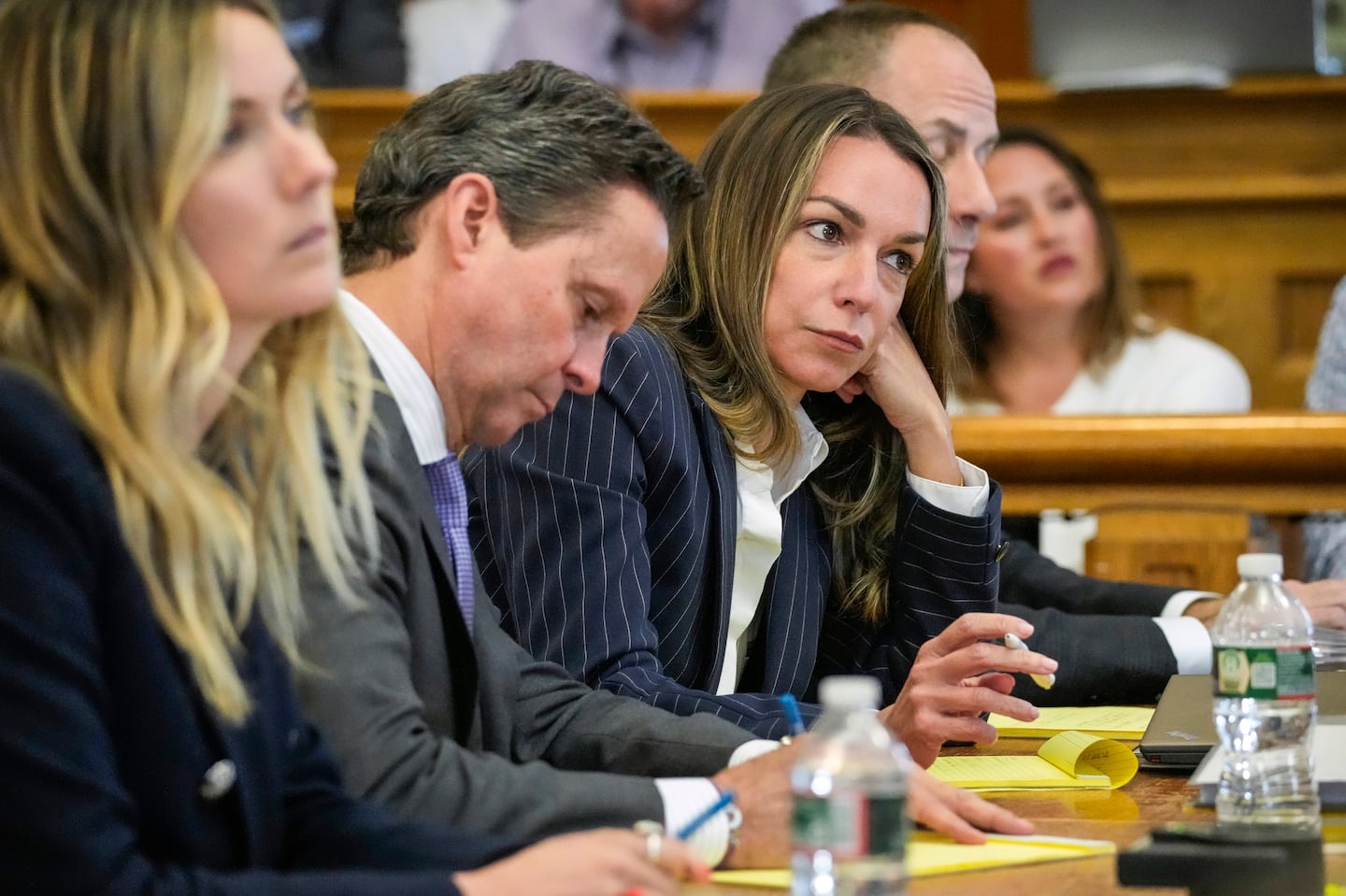 Karen Read, center right, sits at the defense table during her trial in Norfolk Super Court in Dedham.