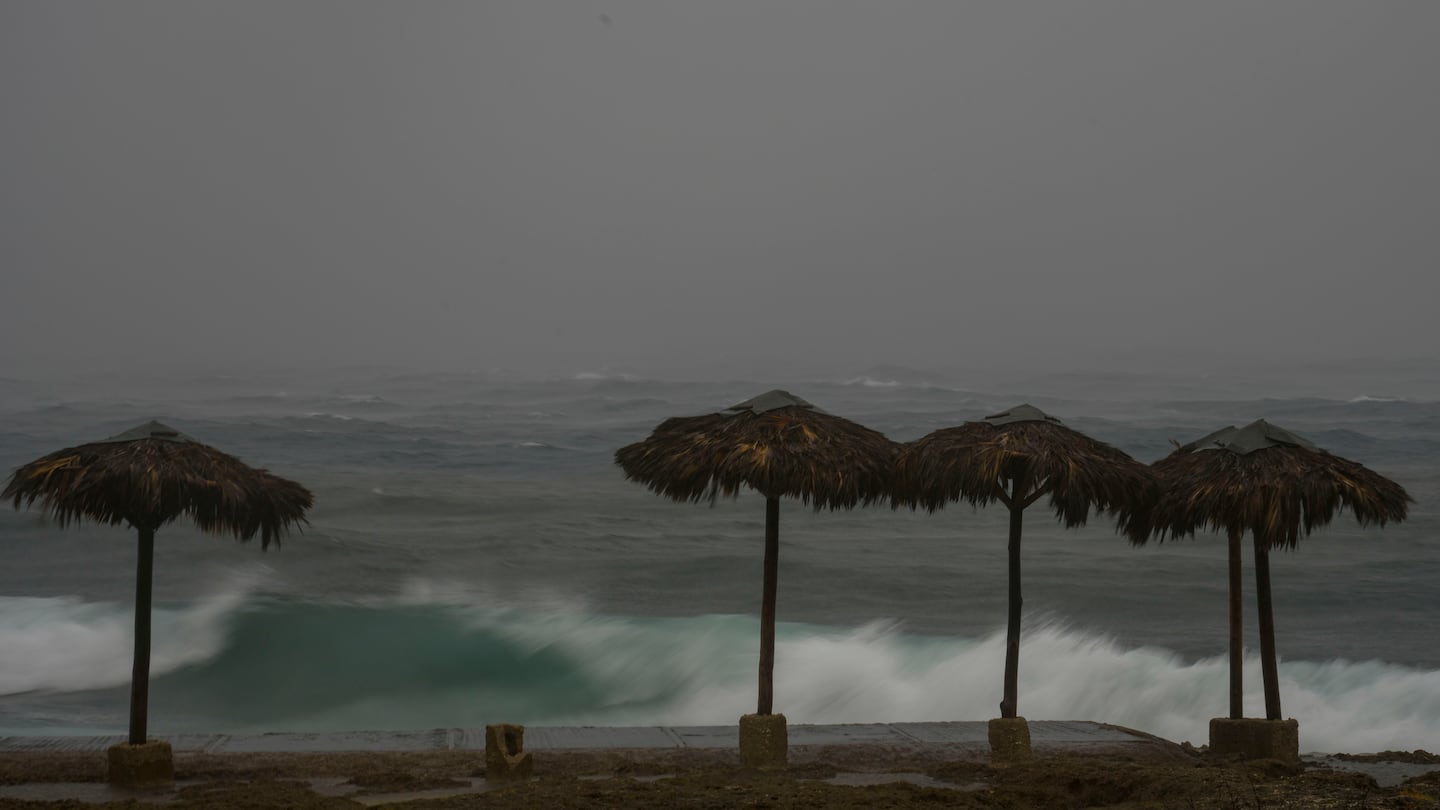 Waves broke on the beach during the passing of Hurricane Rafael in Havana, Cuba, Wednesday.