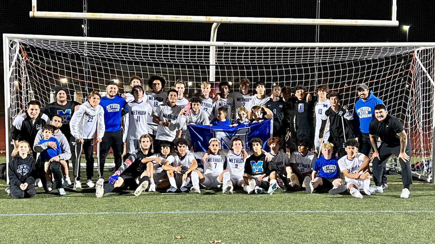 The No. 35 seed Methuen boys' soccer team celebrates its 2-1 upset of No. 3 Weymouth in a MIAA Division 1 boys' soccer matchup on Wednesday night.