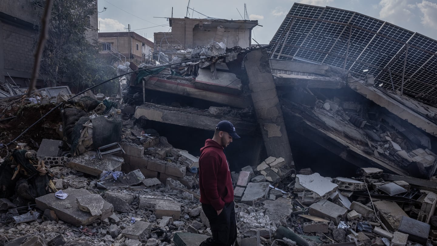 A man walked through rubble in a residential area where an Israeli airstrike killed 14 people the day before, according to Lebanese officials, in the village of Nasriyet Riziq on Thursday near Baalbek, Lebanon. Israel has increasingly targeted Lebanon's eastern city of Baalbek and the surrounding Bekaa valley, considered a bastion of Hezbollah support. Earlier this week, Israel ordered residents of Baalbek and neighboring towns to evacuate before a new wave of strikes.