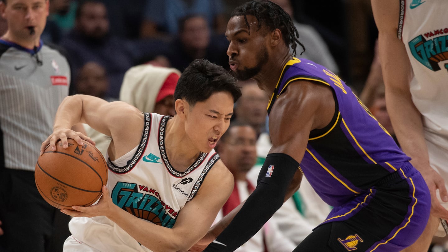 Bronny James (right) was sent to the Lakers' G League affiliate, South Bay, on Thursday before the start of its season.