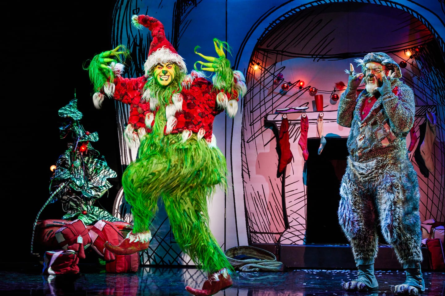 James Schultz as the Grinch and W. Scott Stewart as Old Max in "How the Grinch Stole Christmas! The Musical."