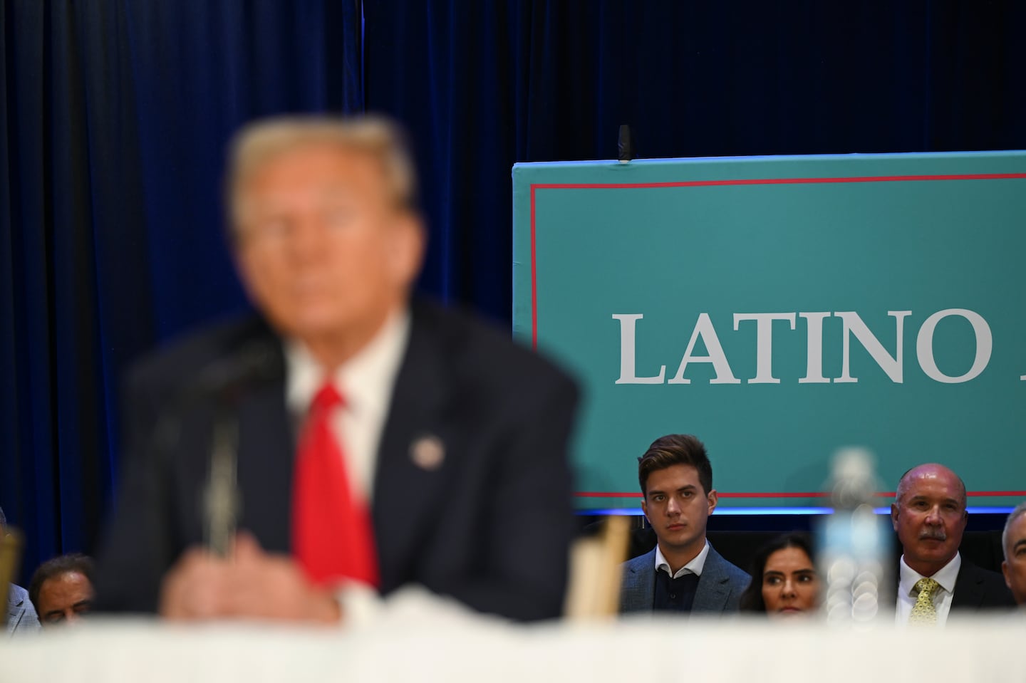 People listened as Donald Trump attended a roundtable discussion with Latino leaders in Doral, Fla., Oct. 22.