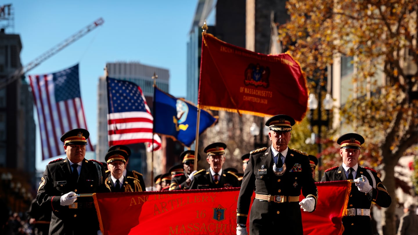 Members of the Ancient and Honorable Artillery Company marched on Boylston Street in the Boston veterans Salute to Service Parade Saturday.