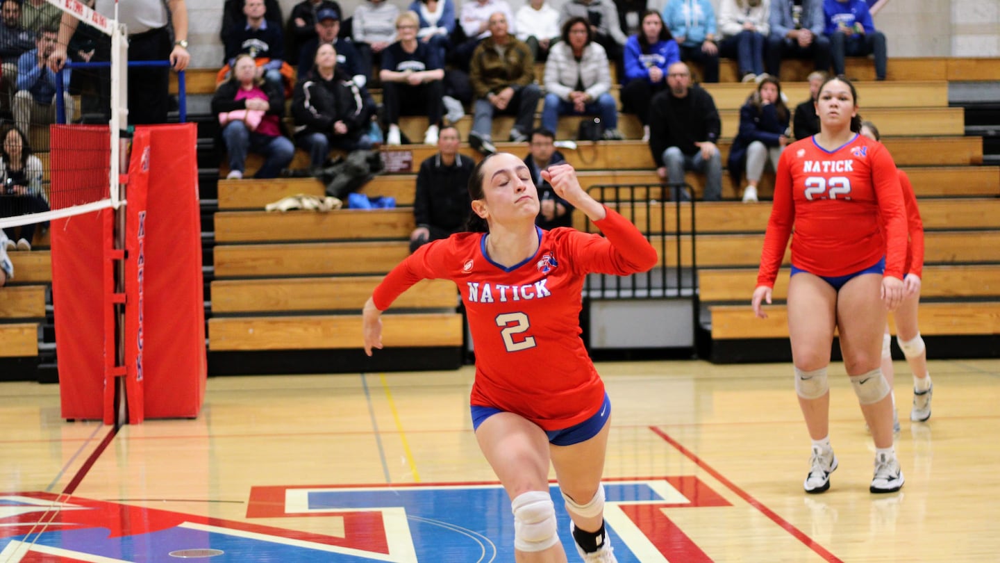 Senior Eva Sotiri prepares to dive for a ball during Natick's 3-2 win over visiting Lexington in the MIAA Division 1 girls' volleyball tournament on Nov. 4, 2024.