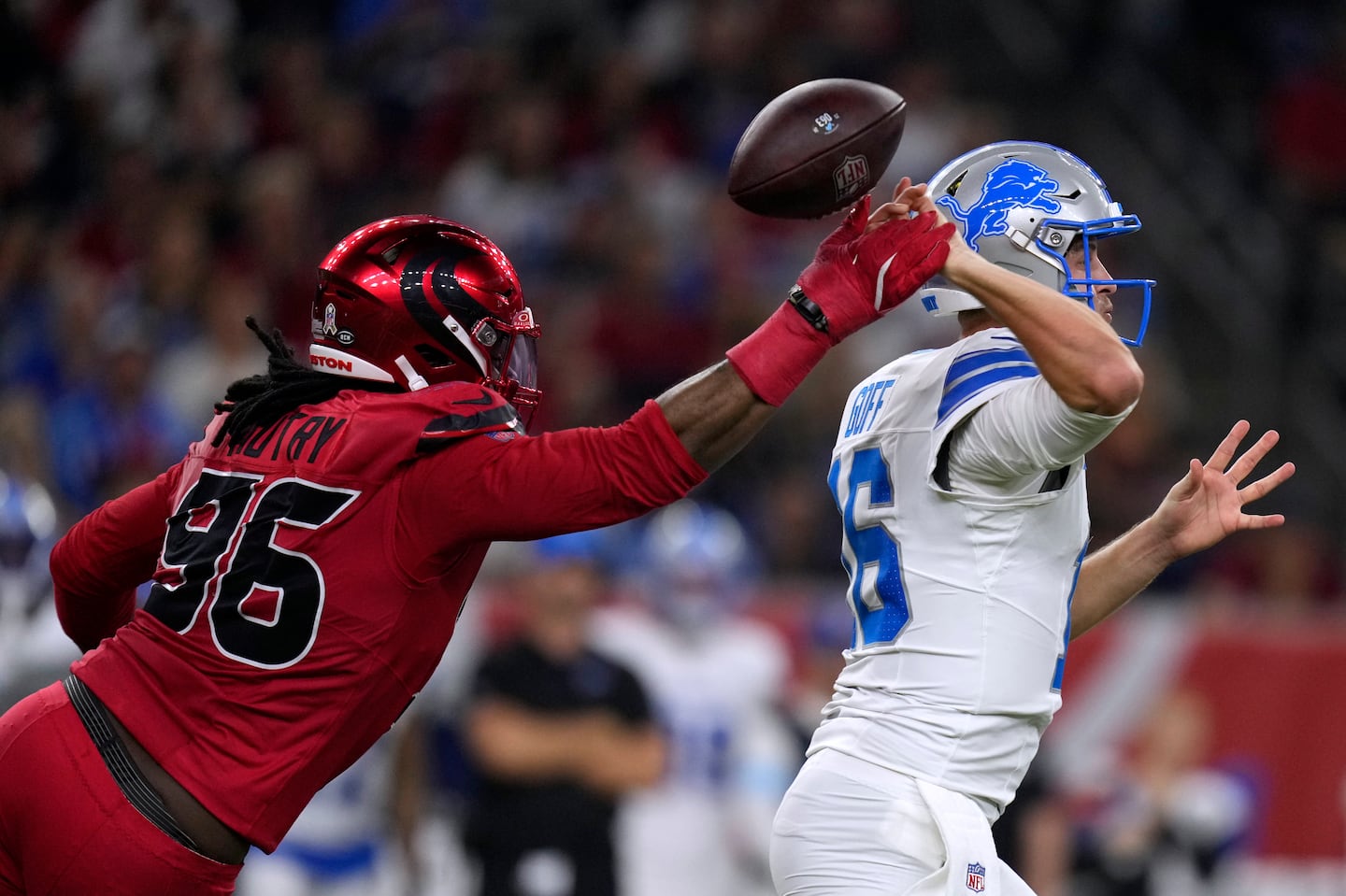 Quarterback Jared Goff (right) did not have a good day (five interceptions) but the Lions managed to beat the Texans.