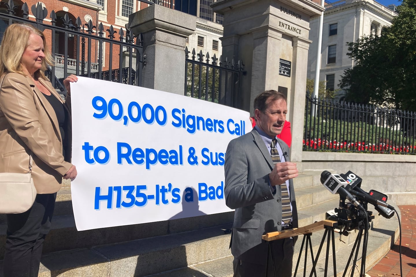 Gun shop owner and Second Amendment advocate Toby Leary announced that firearms activists had collected enough signatures to place a question on the Massachusetts 2026 ballot that would repeal the state's new sweeping gun law, outside the Massachusetts State House in Boston on Oct. 8.