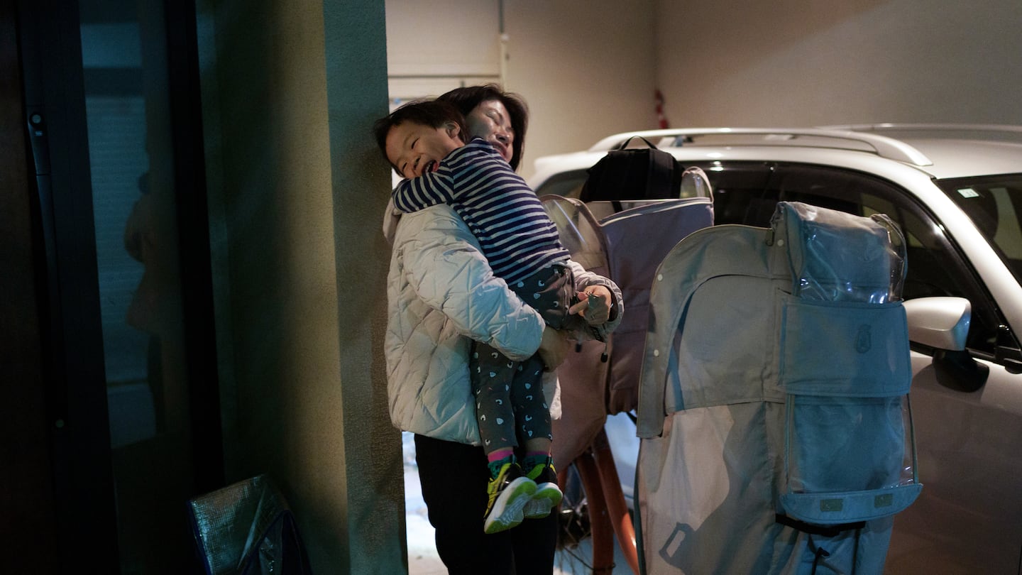 Hanako Okada, who upset an incumbent to win a seat representing the struggling Aomori district where she grew up, picked up her son from a day care in Tokyo on Nov. 7. Some voters in the prefecture say they chose Okada not simply to reject the incumbent but because she understood their daily concerns.