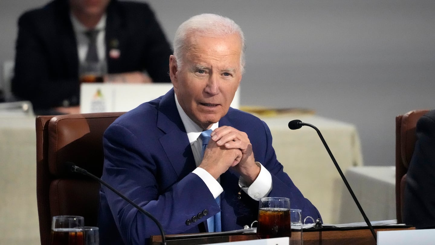 President Joe Biden speaks while sitting next to other leaders during the Asia-Pacific Economic Cooperation (APEC) conference, Thursday, Nov. 16, 2023, in San Francisco.