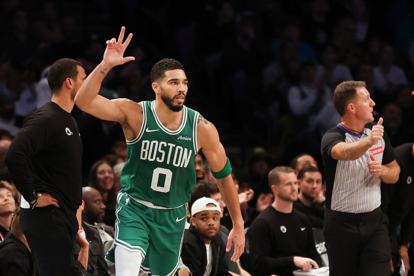 Jayson Tatum hit a first-half three, part of his 16 points before the break against the Nets.