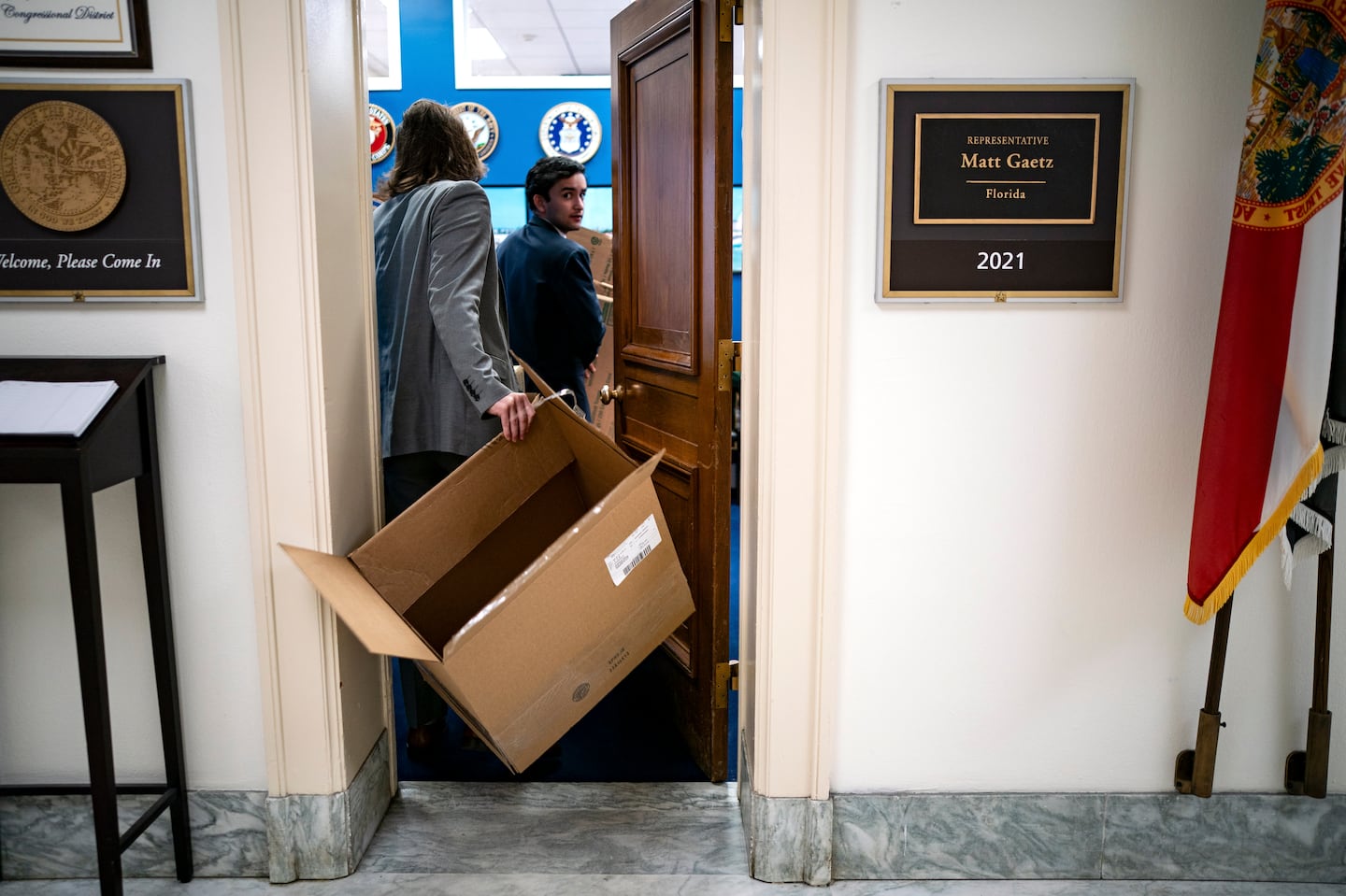 People carry empty boxes into the office of Representative Matt Gaetz, who resigned late Wednesday night after he was nominated by President-elect Donald Trump to be his attorney general, on Capitol Hill, in Washington, Nov. 14, 2024.