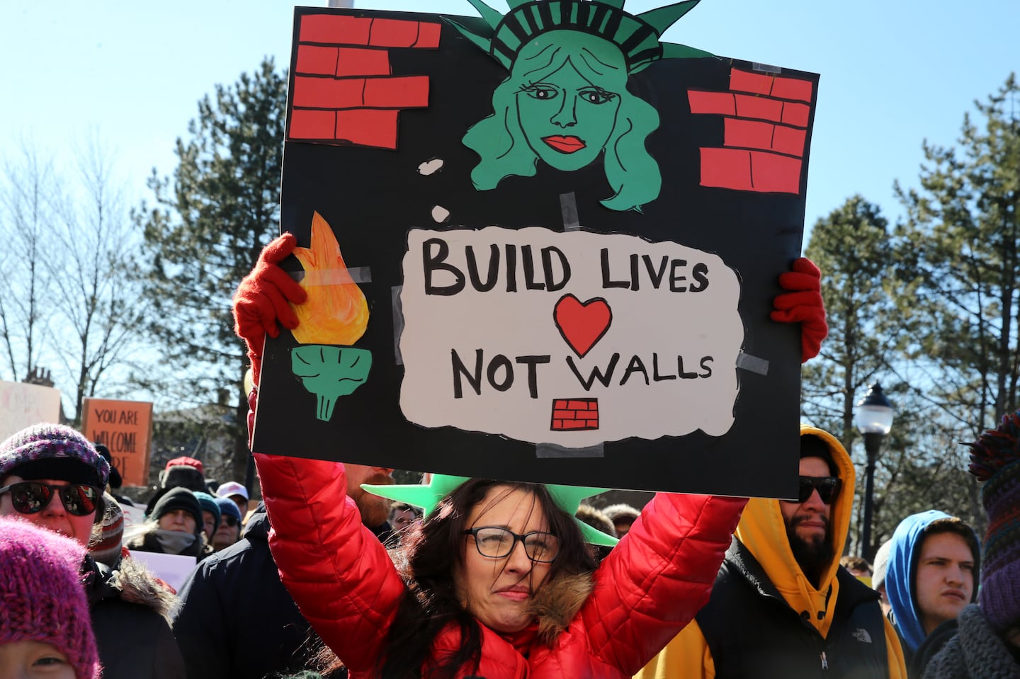 People rallied in Somerville to show support for its "sanctuary city" designation in 2017.