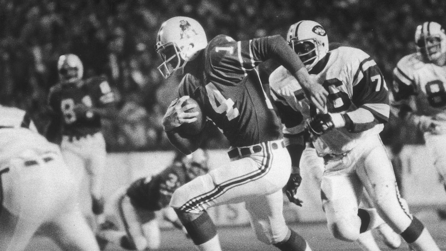 Steve Grogan was off and running against the Jets in an October 1976 game — a game in which he had 103 yards on the ground.