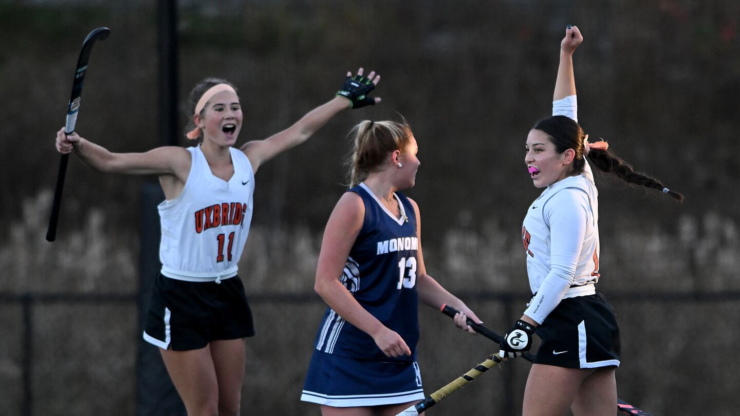 Uxbridge’s Julianna Casucci (right) celebrates her third goal of the game with teammate Ava Rosborough (left).