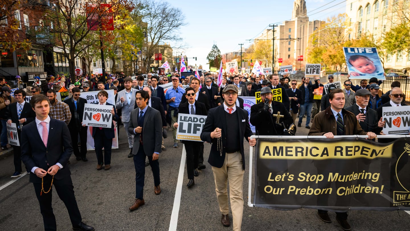 Participants marched down Commonwealth Avenue as the Men’s March to Abolish Abortion and Rally for Personhood started Saturday.