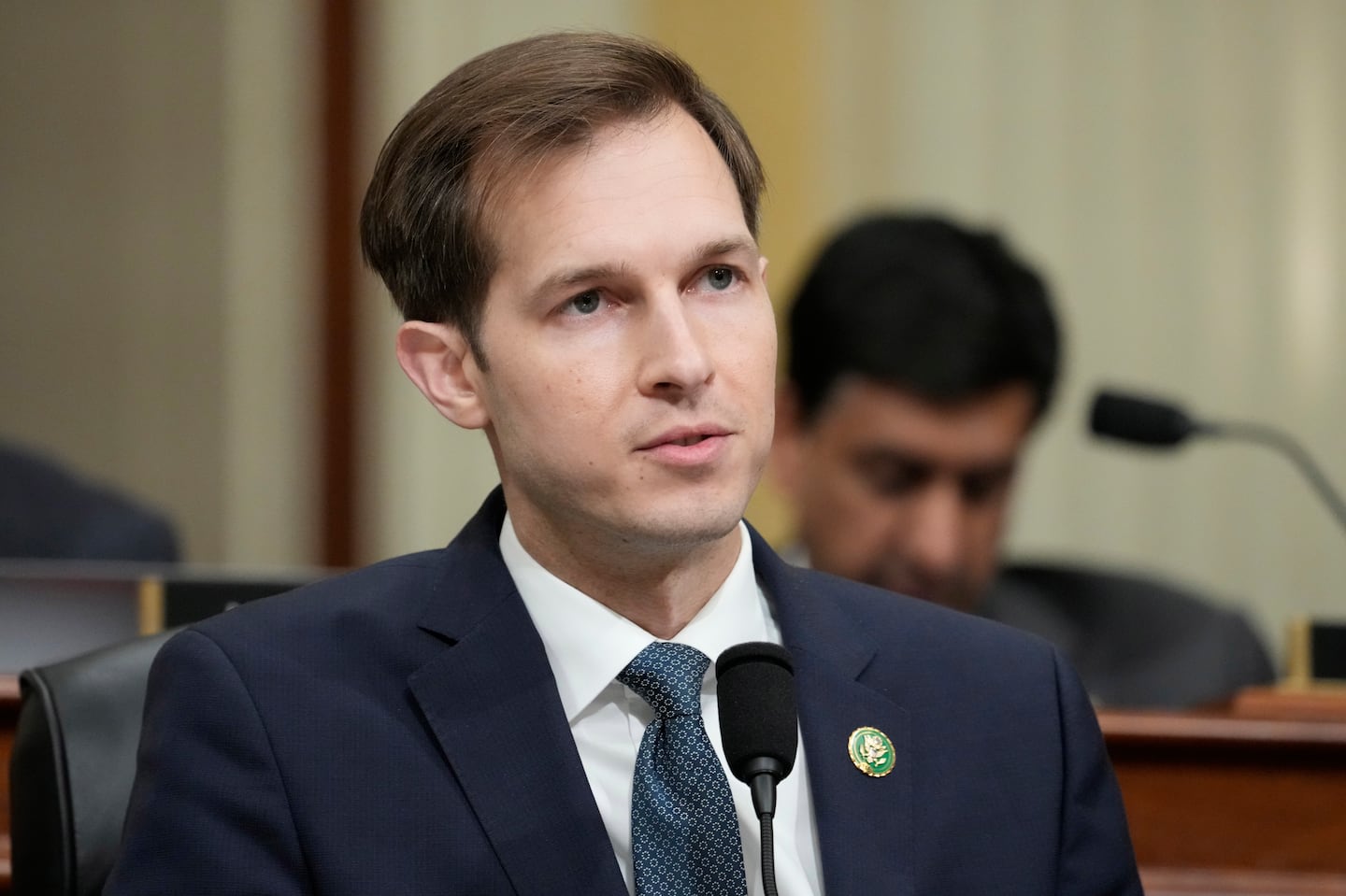 Representative Jake Auchincloss, Democrat of Massachusetts, questions witnesses during a Congressional hearing.