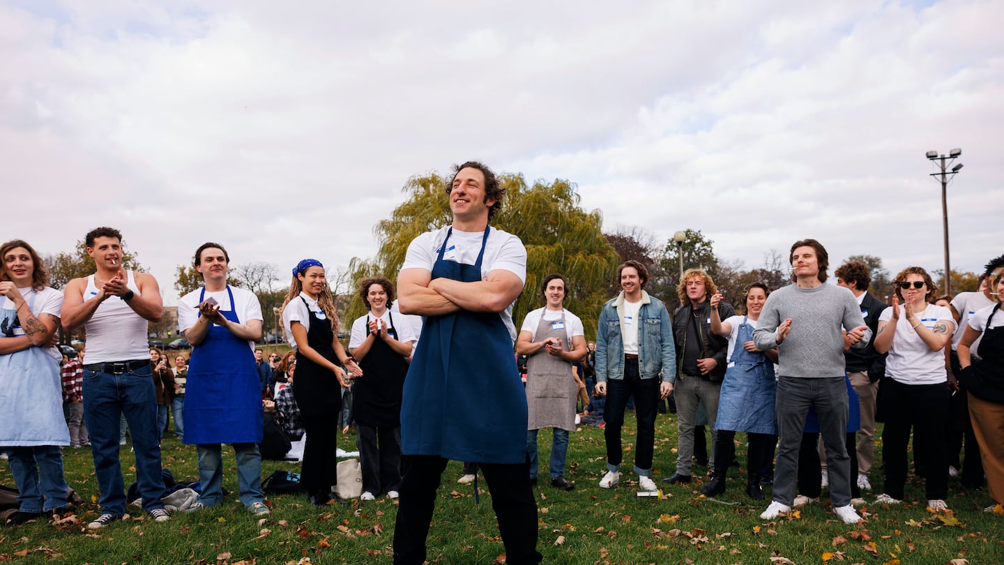 The winner, Ben Shabad stands in front to cheers while attendees vote during a Jeremy Allen White look a like at contest at Humboldt Park in Chicago. 