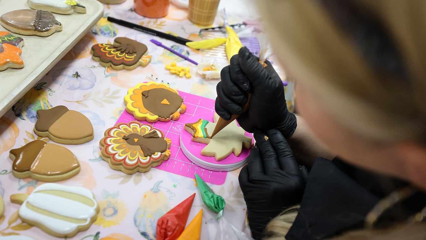 At Lorraine’s Cake & Candy Supplies in Hanover, Melissa Mason runs a class on cookie decorating.