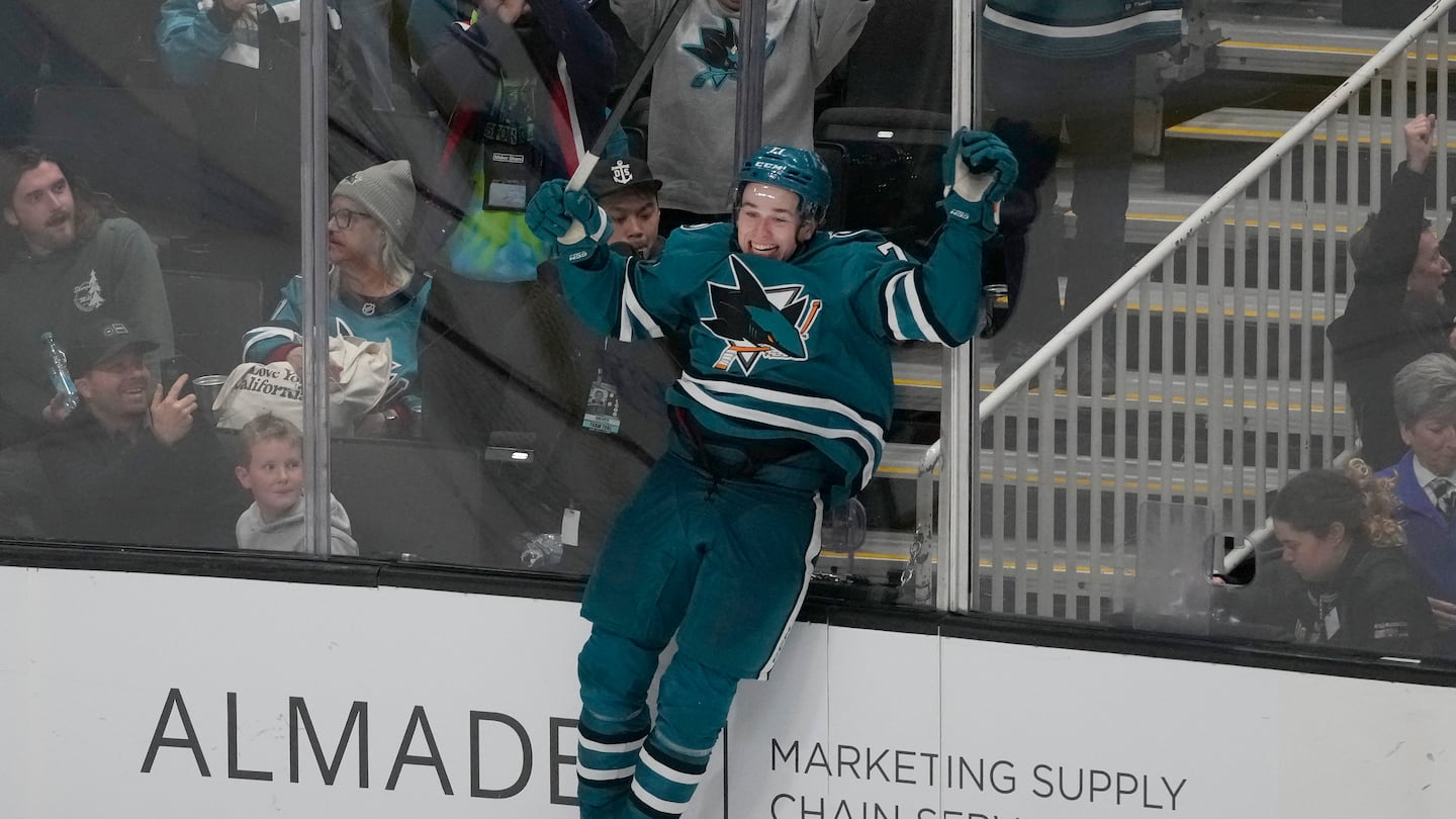 Macklin Celebrini celebrated after scoring the winning goal during overtime against the Detroit Red Wings Monday night.