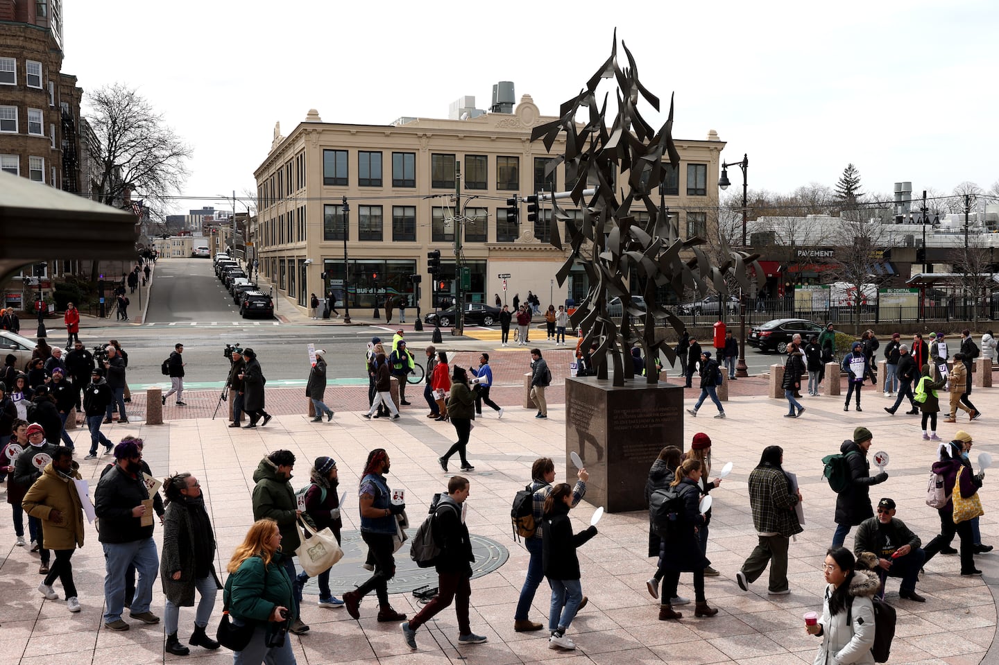 Questions are swirling about how Boston University's move to cut a dozen PhD programs in the coming academic year is connected to the graduate student workers’ record-breaking seven-month strike.