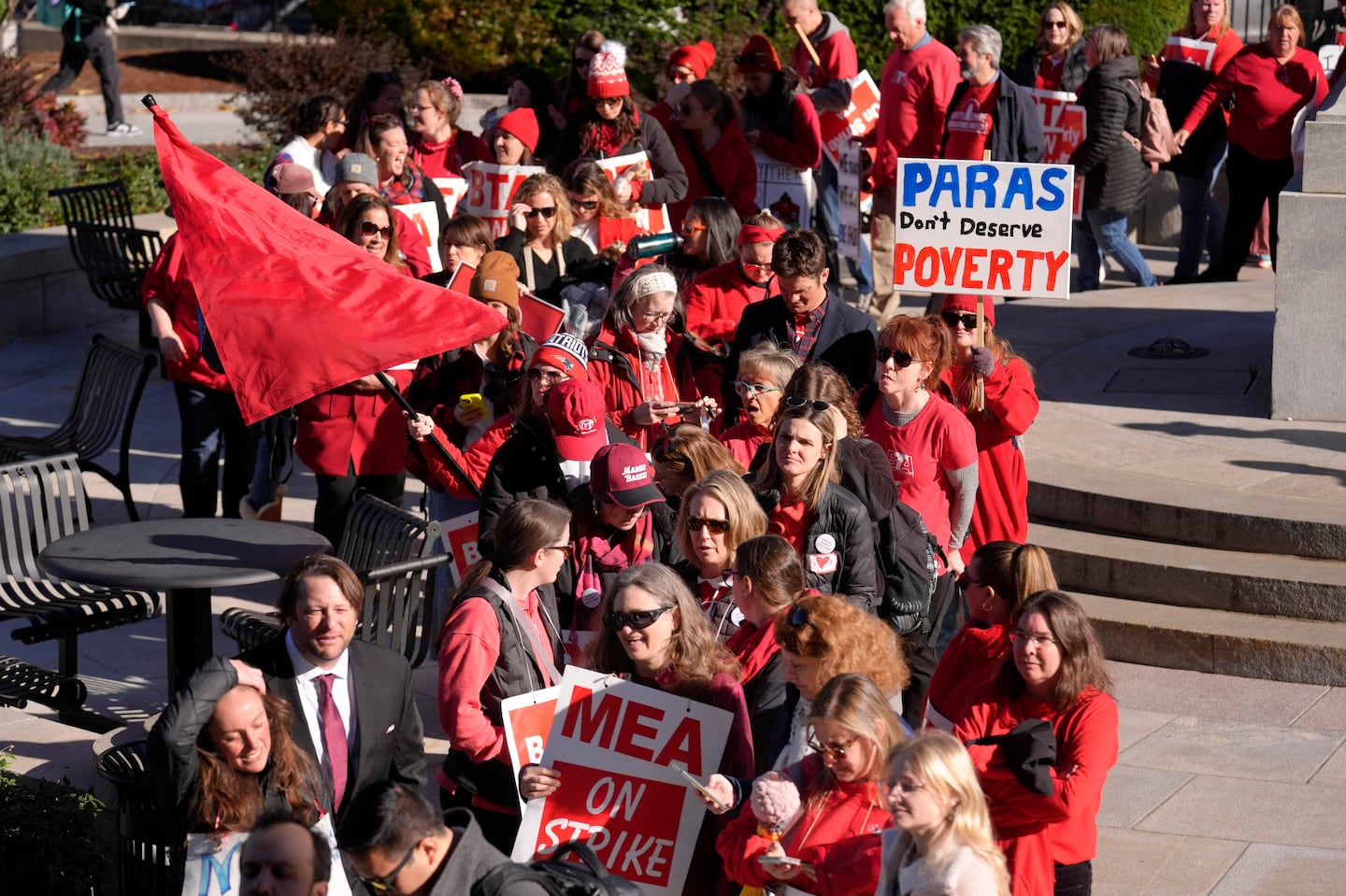 Striking teachers and supporters waited to enter the State House in Boston amid stalled contract negotiations.