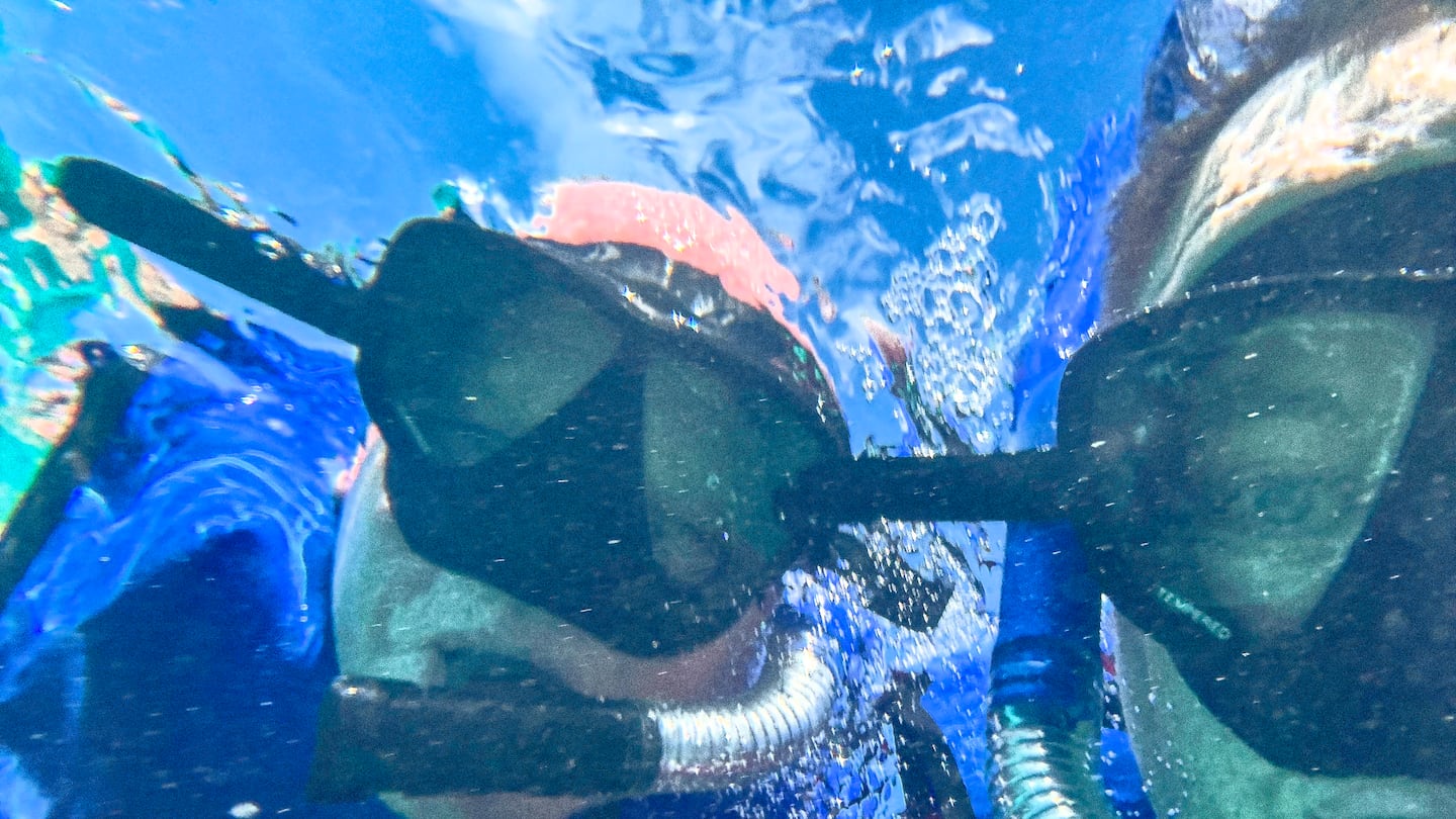 The writer, at right, and his friend Craig pose for a selfie while snorkeling in Key West.