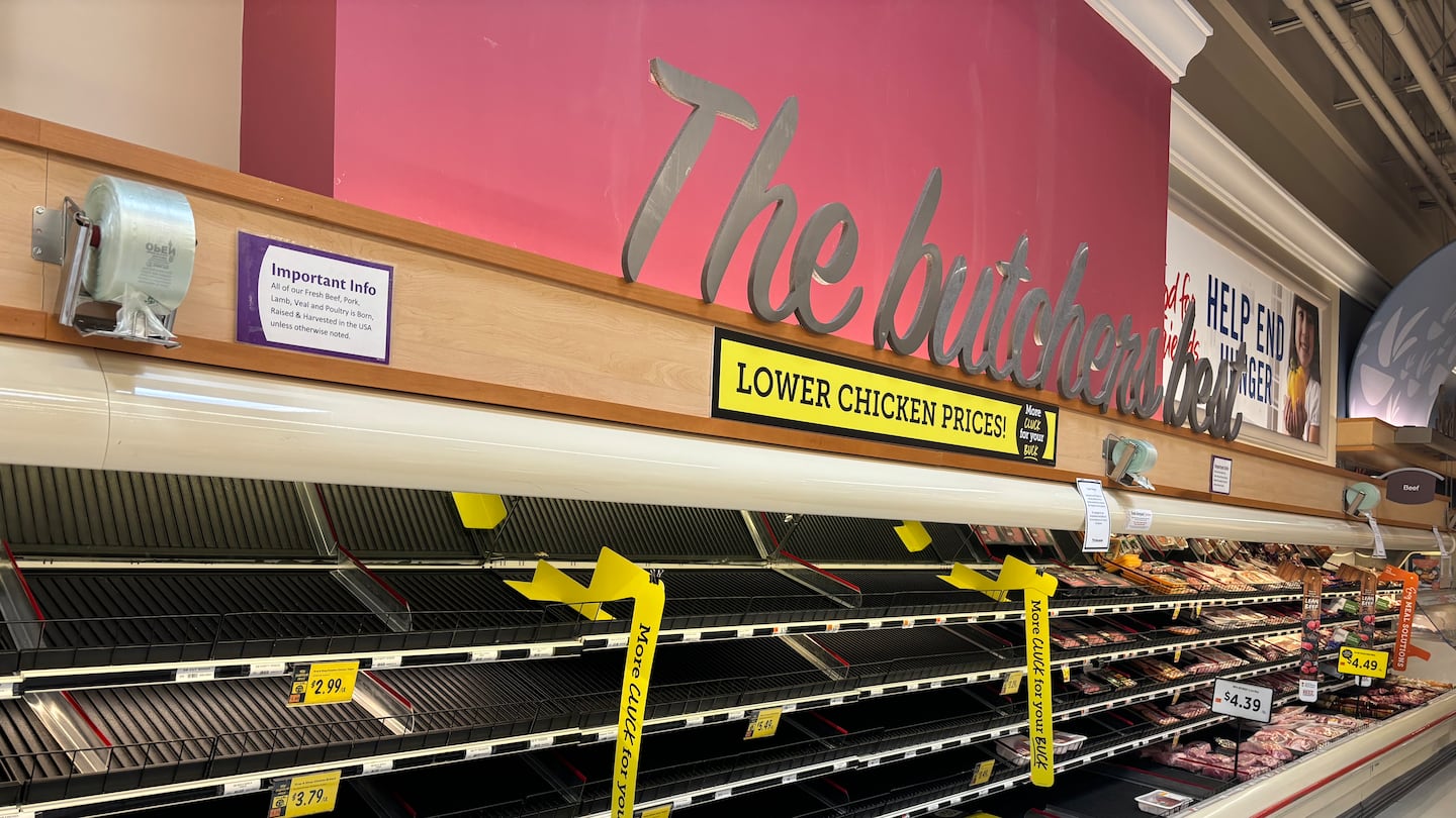 Chicken shelves were empty Sunday at the Stop & Shop in Hyde Park.