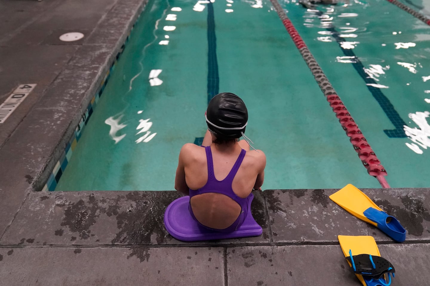 A 12-year-old transgender girl who is a competitive swimmer seen at a pool in Utah in Feb. 2021.