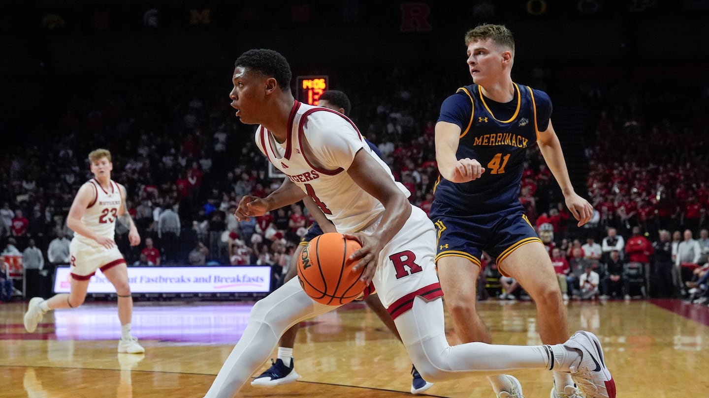 Rutgers' Ace Bailey drives past Merrimack's Armandas Plintauskas during the second half.