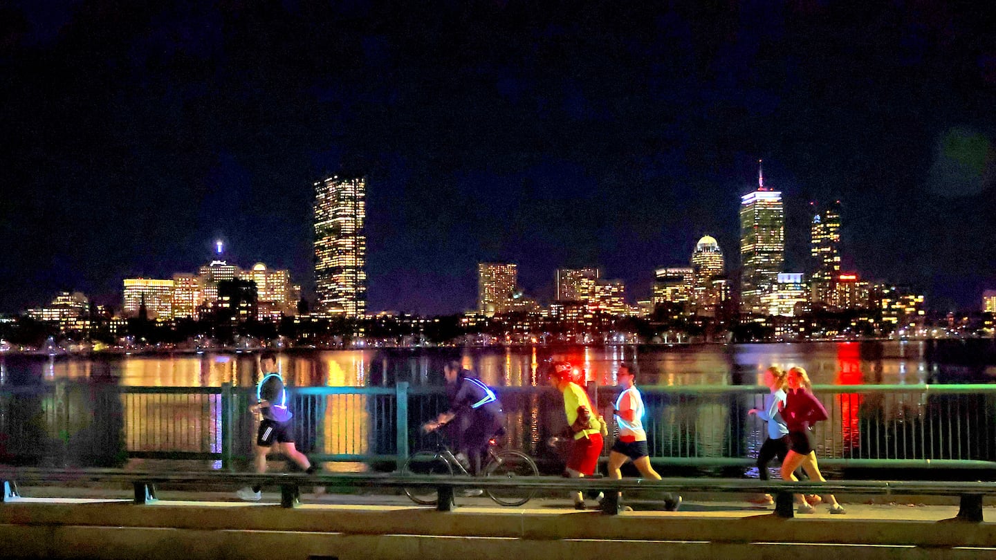 It was clear weather for an evening jog and bike ride along the Charles River Wednesday with a view of Boston from the Cambridge side.