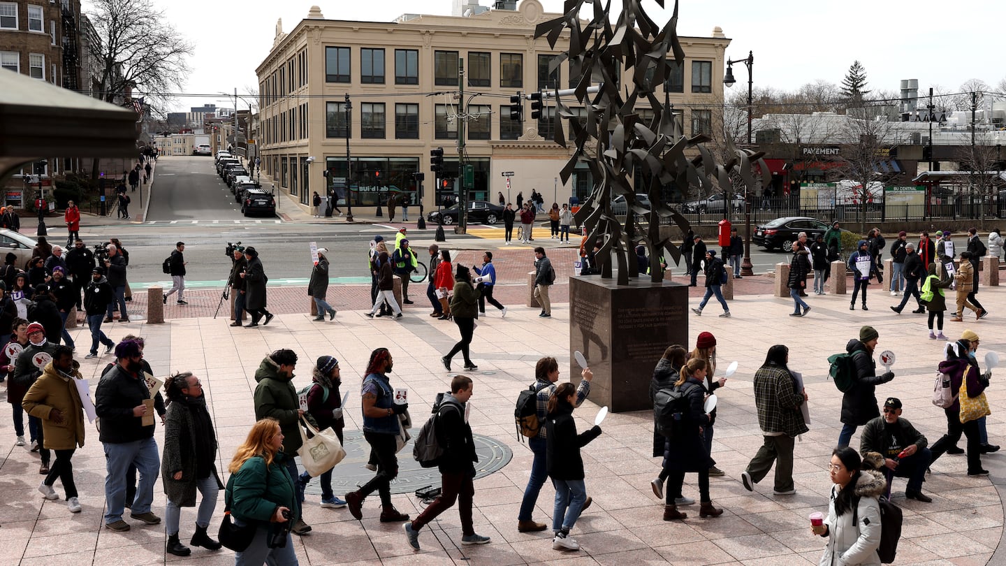 Questions are swirling about how Boston University's move to cut a dozen PhD programs in the coming academic year is connected to the graduate student workers’ record-breaking seven-month strike.