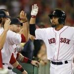 Shane Victorino celebrated after a home run in the eighth inning against the Mariners at Fenway Park on Thursday.