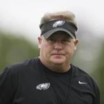New Eagles coach Chip Kelly walked on the field during Thursday’s joint workout with the Patriots.