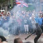 Pro-British protesters clashed with riot police in downtown Belfast on Friday.