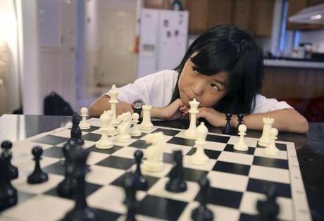 Already judged a chess expert, 9-year-old Carissa Yip of Chelmsford seeks master status.
