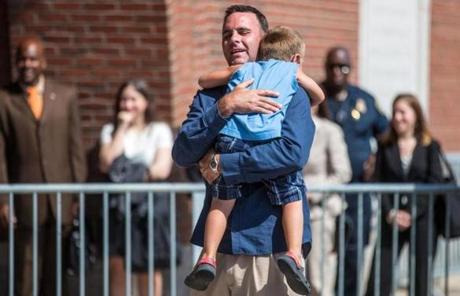 Tommy Donahue, whose father was killed by Bulger,  picked up his godson after speaking to the media. 
