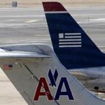 American Airlines and US Airways jets prepared for flight at the Philadelphia International Airport in February. 