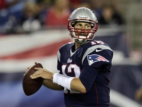 Tom Brady looked to pass against the Buccaneers during the first quarter.
