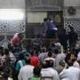 Demonstrators in support of ousted Egyptian President Mohamed Morsi waited by the barricaded door inside al-Fath mosque in Cairo. 