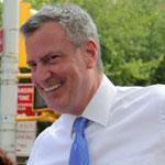 A poll has Bill de Blasio (right) ahead among Democrats in a race for New York City mayor.