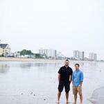 Myke Wilkerson and Brandon Allison, pictured on Revere Beach, moved their families here from Texas to start a new church.