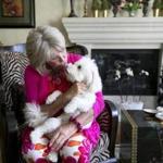 Susan Wornick with her dog Sammy at home in Needham. She announced in June that she will be retiring in March 2014 after more than 30 years in television news.